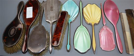 A quantity of assorted silver mounted brushes, mirrors etc. including enamel (plates missing).